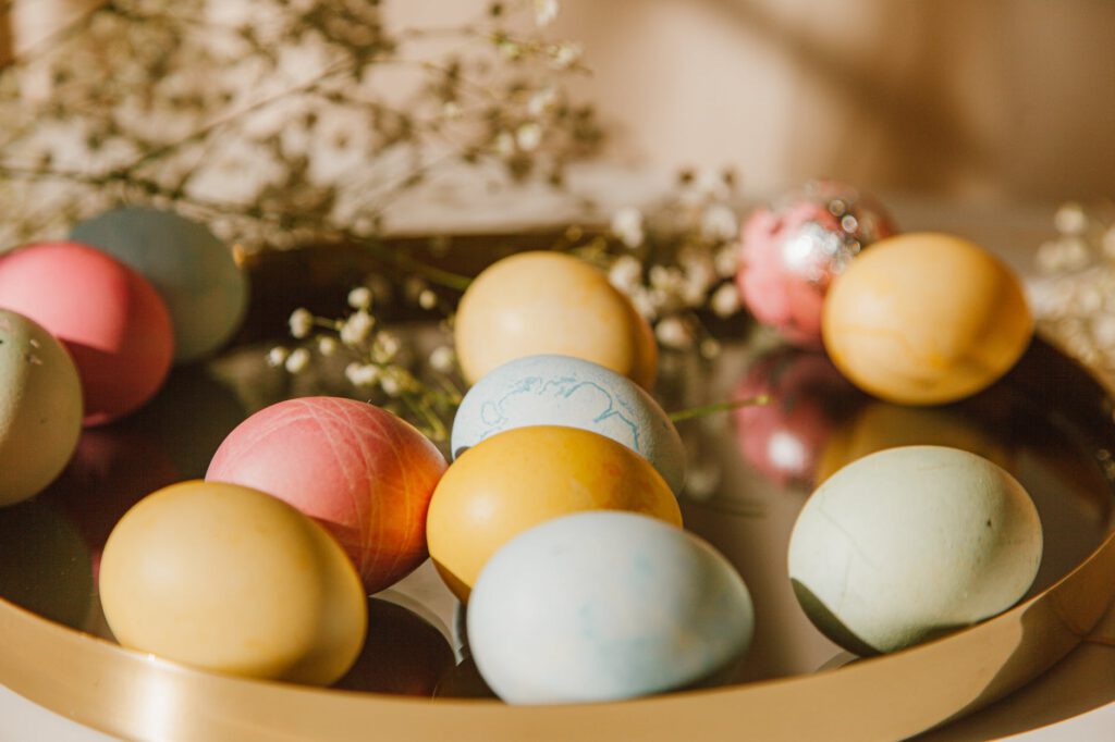 colored diy eggs on a tray